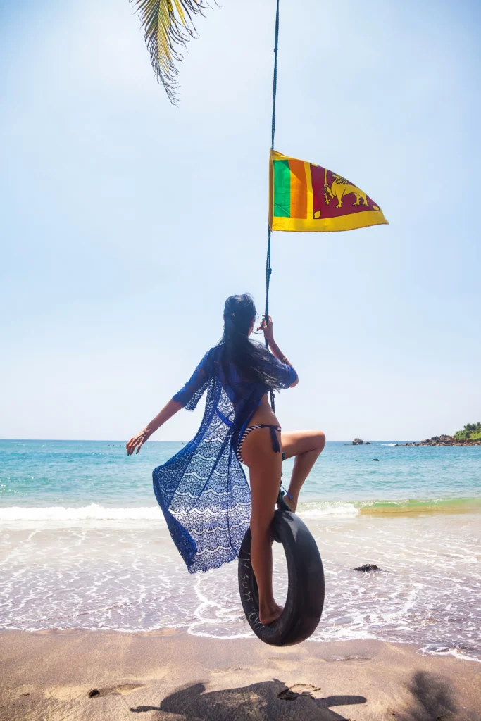 rear-view-woman-in-blue-swimwear-swing-on-bungee-w-2025-03-18-16-15-50-utc