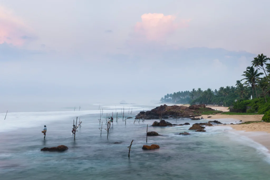 stilt-fishing-stilt-fishermen-at-midigama-beach-2024-09-12-05-25-50-utc